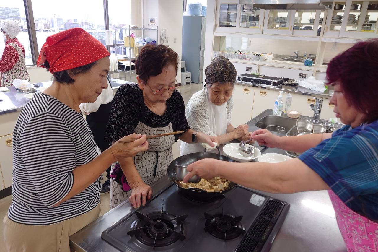 麻婆豆腐で体も心もポカポカに！婦人部料理教室